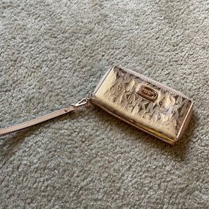 Rose gold Michael Kors wristlet wallet